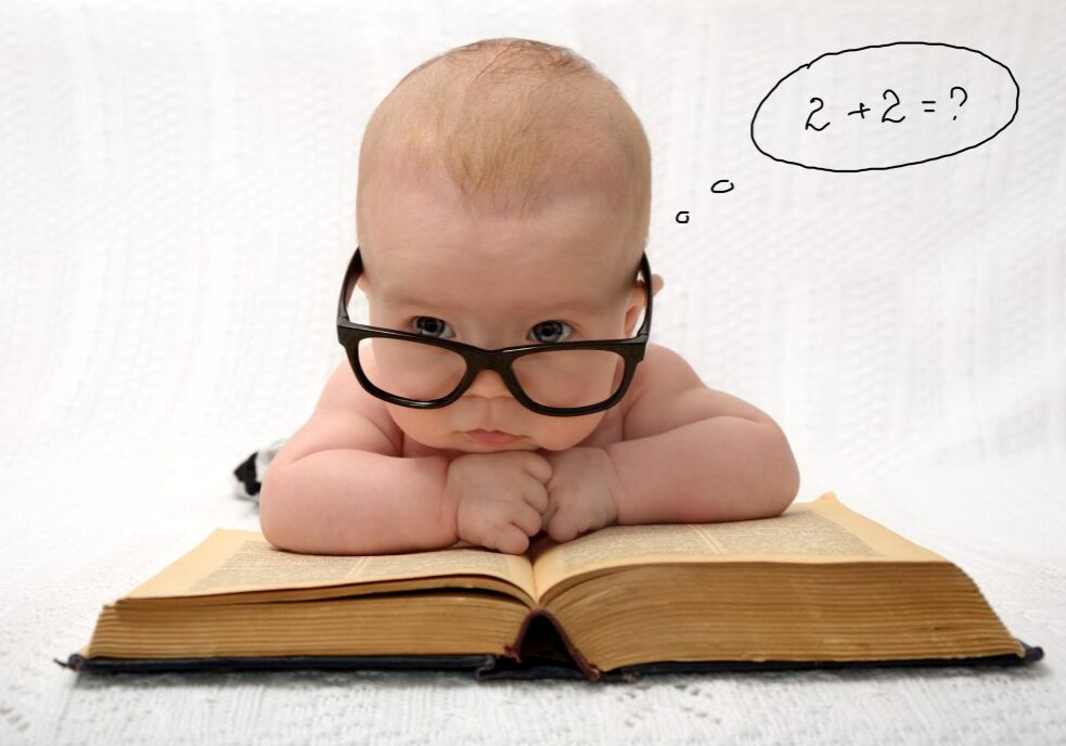 baby in glasses counting in mind portrait of adorable baby in glasses counting in mind with handwritten thought tag with case study